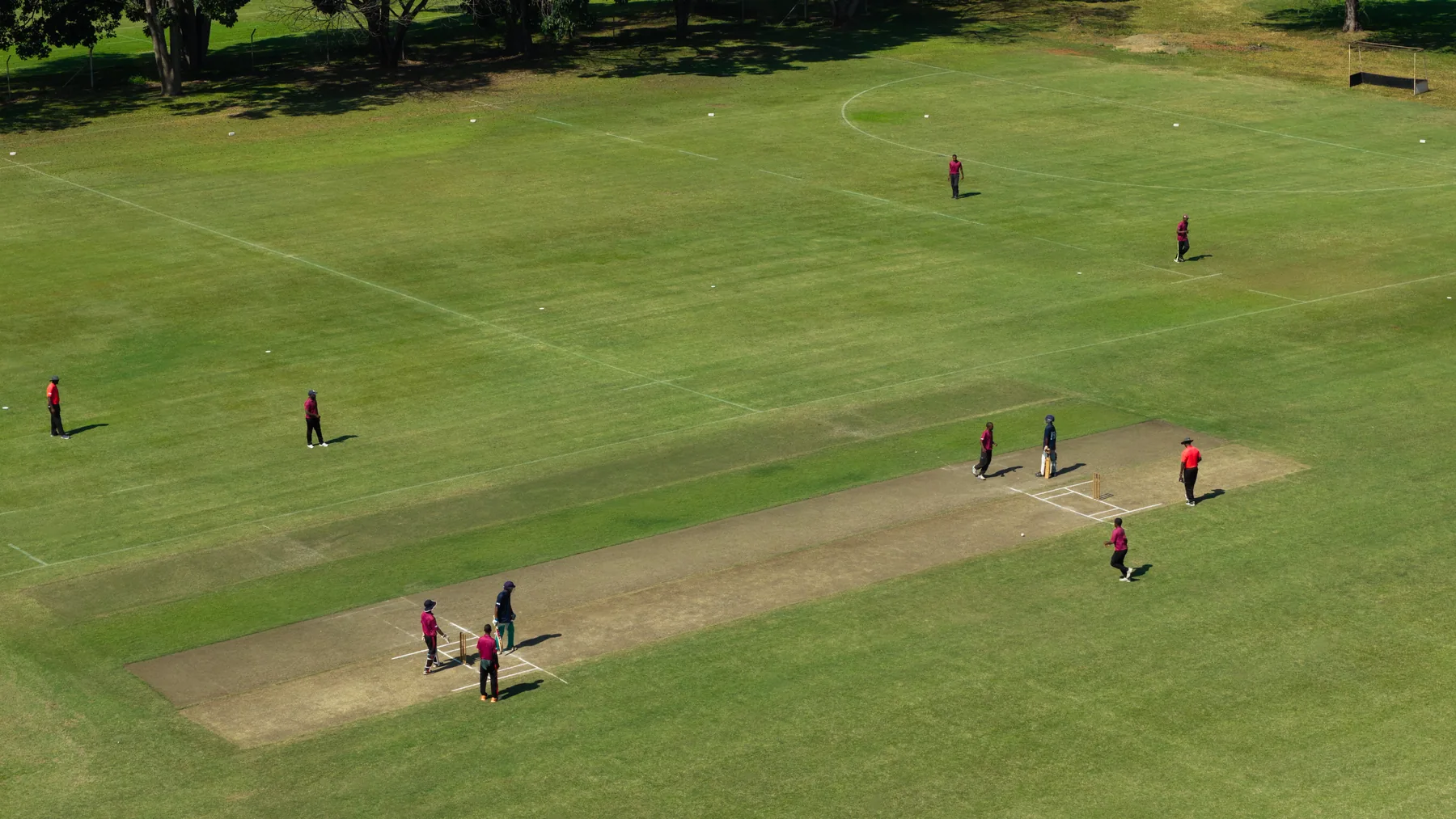 A cricket match in progress on the Triangle oval