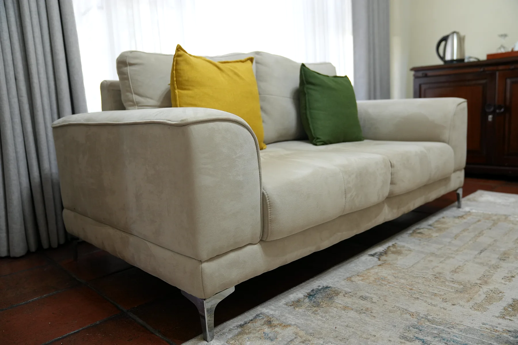 A guest lounge with warm furnishings